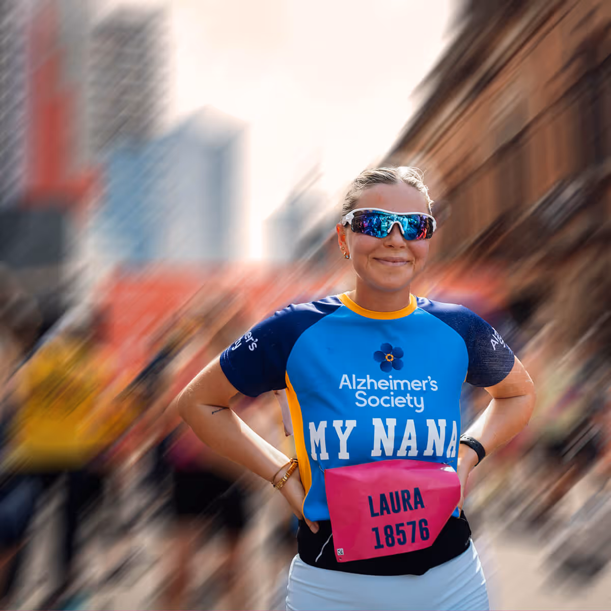 Image shows a smiling runner wearing a charity t-shirt reading For Nan