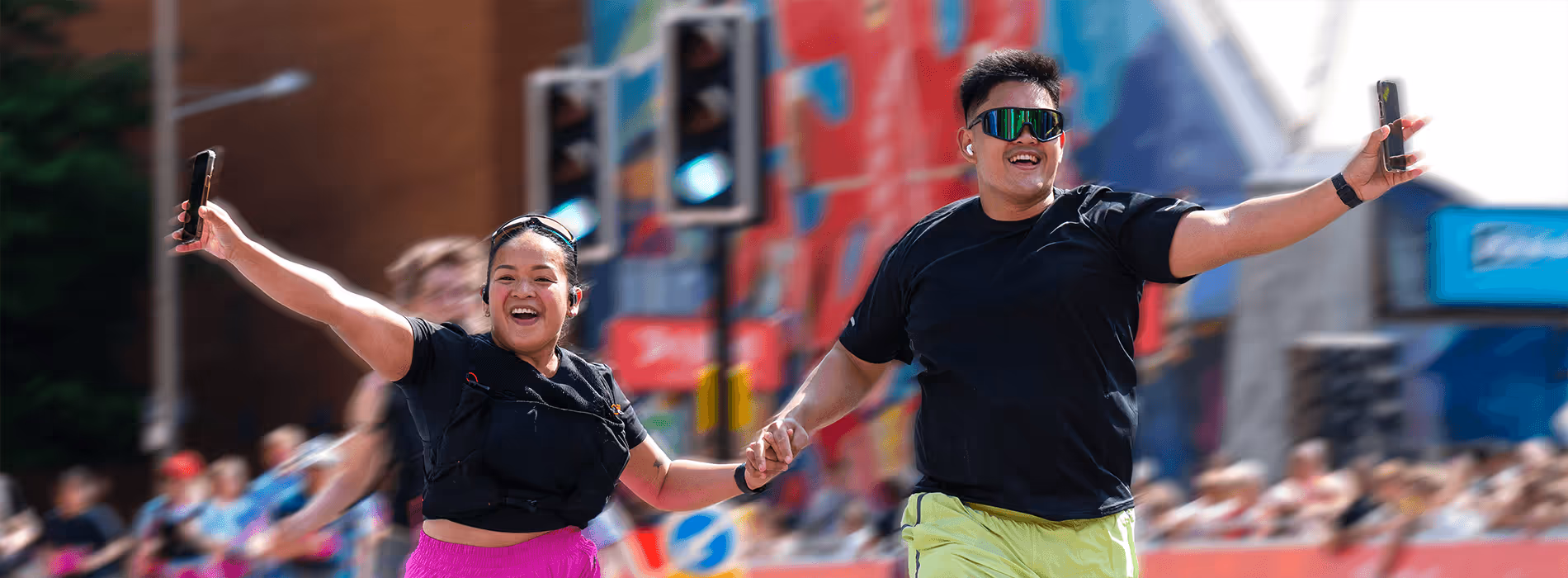 two runners celebrating their run finish