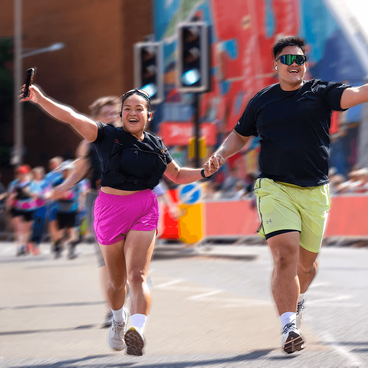 two runners celebrating their run finish